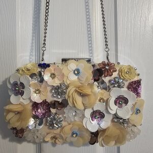 Beautiful beaded flower Clutch bag . Aldo brand